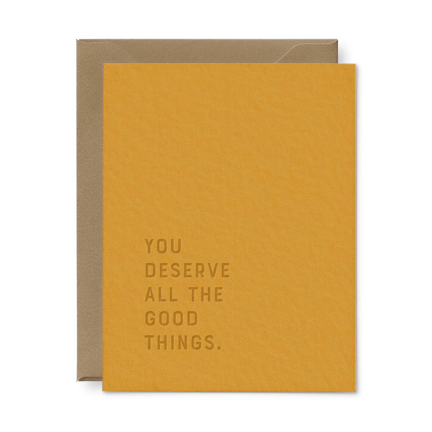 Yellow card with 'You deserve all the good things' text and brown envelope on white background