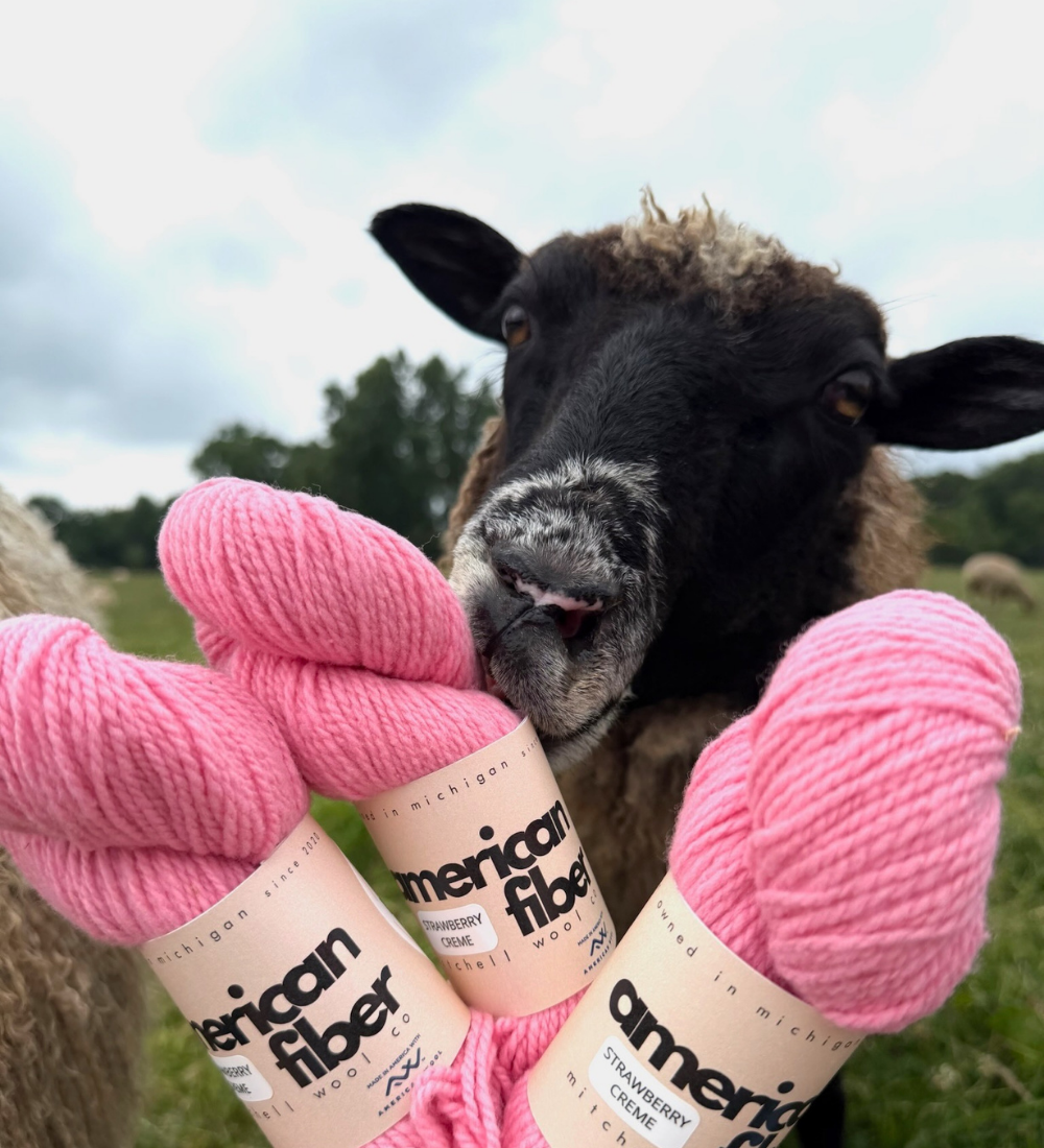Diane inspects our plant dyed pink yarn