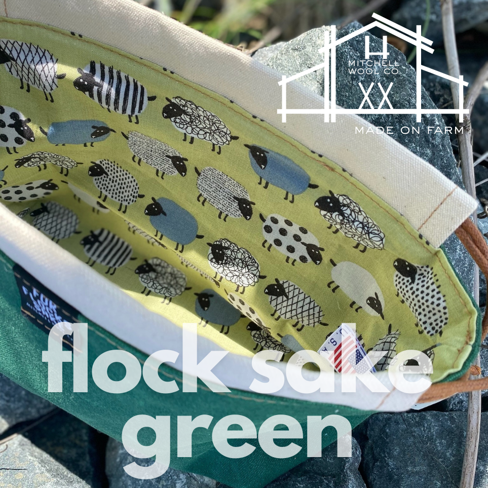 Product with sheep pattern and 'Hitch Mitchell Wool Co' branding on a natural background