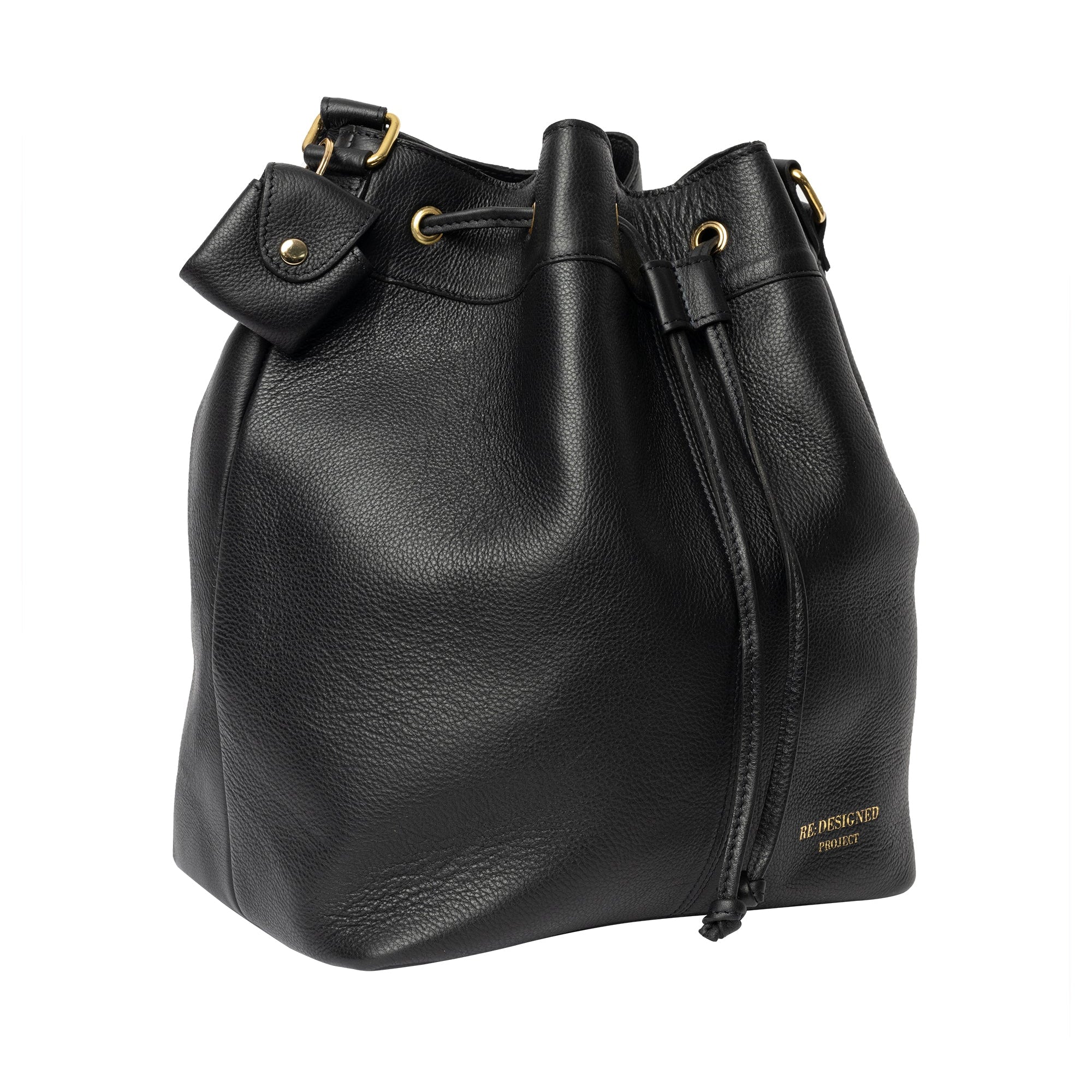 Black leather bucket bag with gold accents on a white background