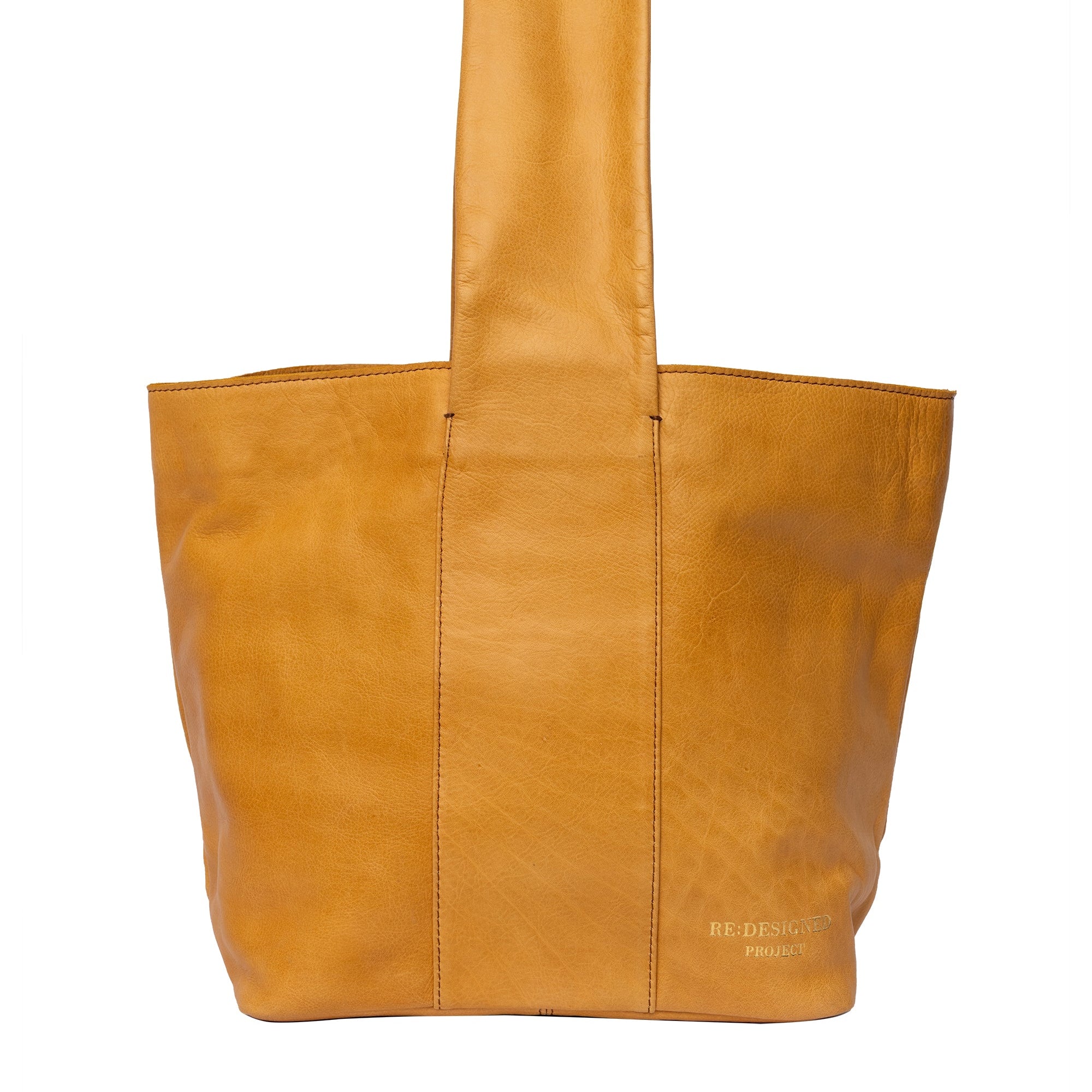 Brown leather tote bag on a white background
