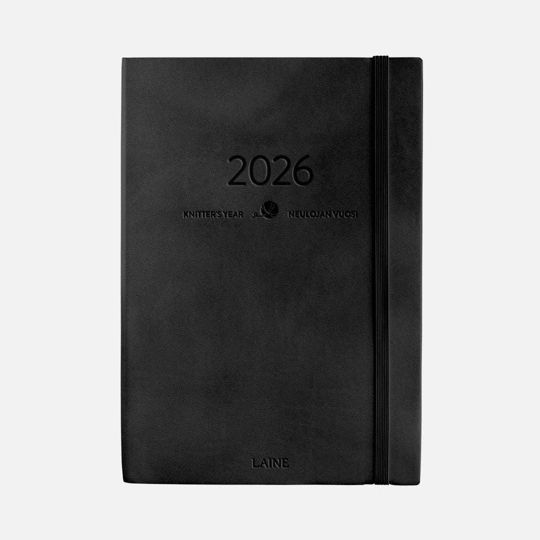 Black notebook with '2026' on a white background