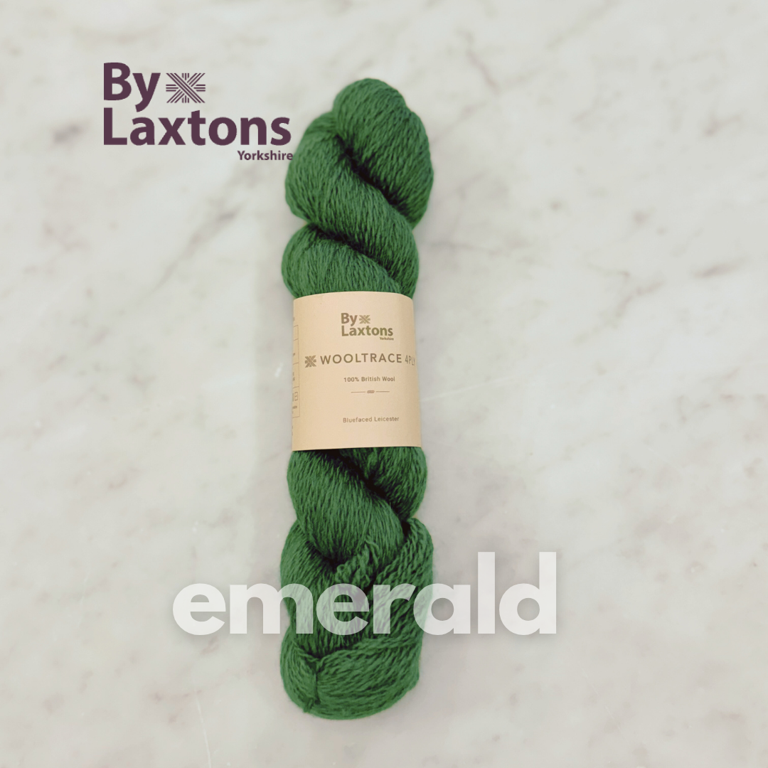 True vibrant Green skein of yarn with a By Laxton's label on a light gray background