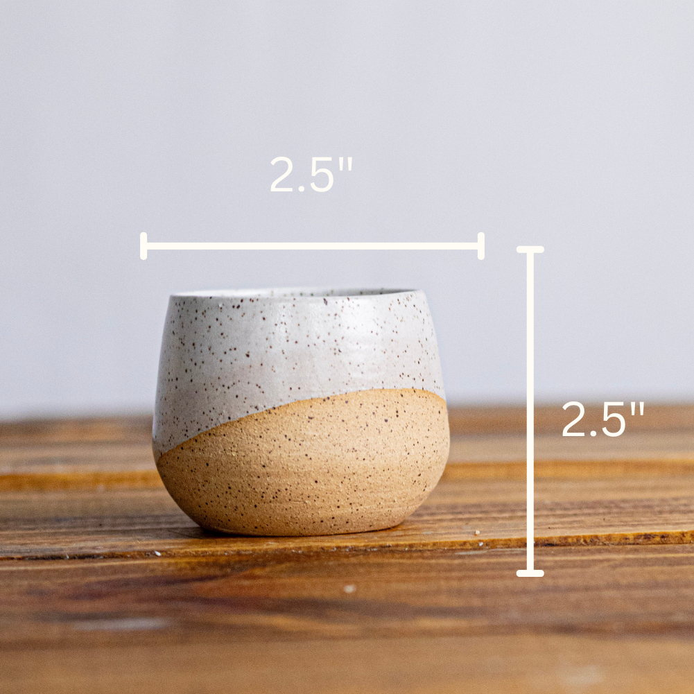 Ceramic lamp with dimensions on a wooden surface